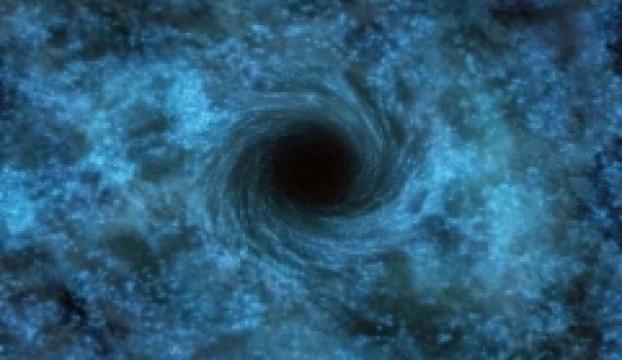 Kozmik &quot;örümcek ağı&quot;nın merkezinde süper kütleli kara delik keşfedildi